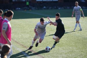 boys playing football